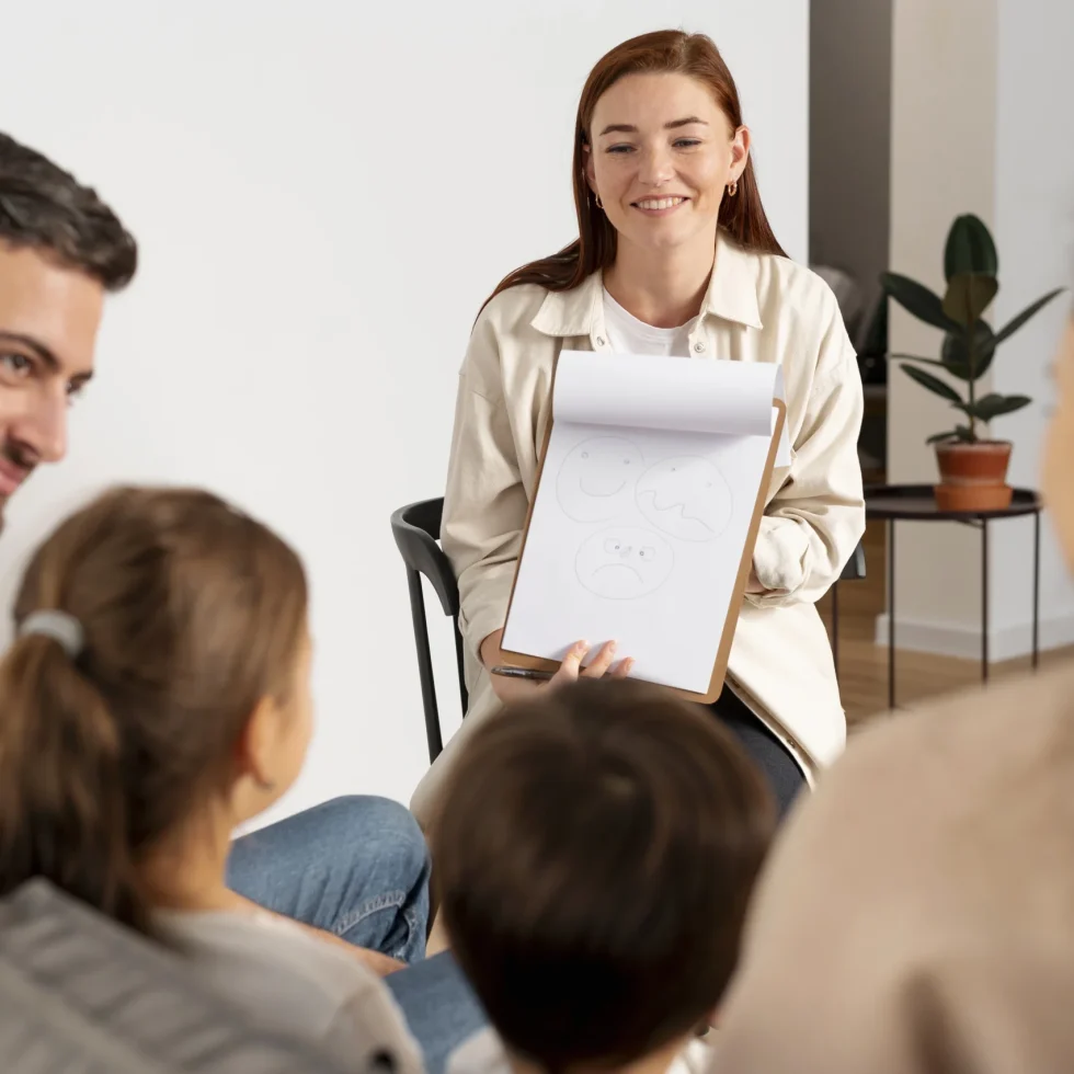 close-up-family-members-talking-therapist